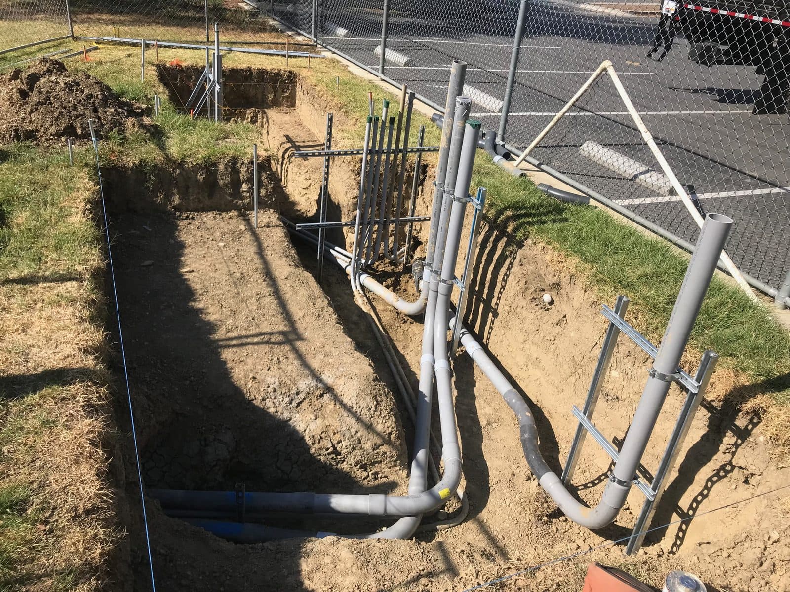 Underground conduit and duct bank rough-in for an industrial feeder